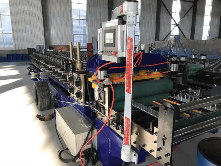 Wall panel cladding machine